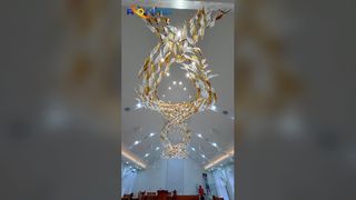 Lámpara de araña de cinta de cristal artística personalizada para salas de banquetes, casas club, vestíbulos de hoteles, departamento de ventas