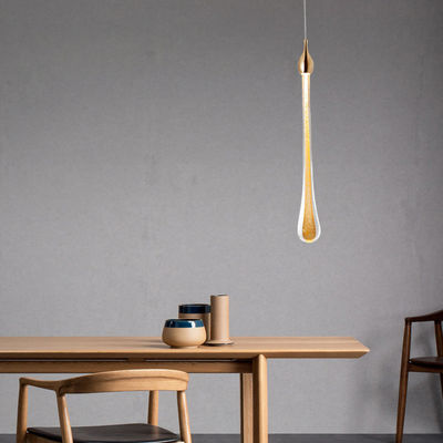 Gota de lluvia oro de cabeza única pequeña lámpara de lujo de vidrio de cobre LED lámpara colgante nórdica simple luz colgante de la cama