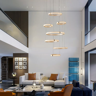 Villa interior nórdica Gran iluminación Lustrero moderno anillo creativo hueco luz colgante giratoria